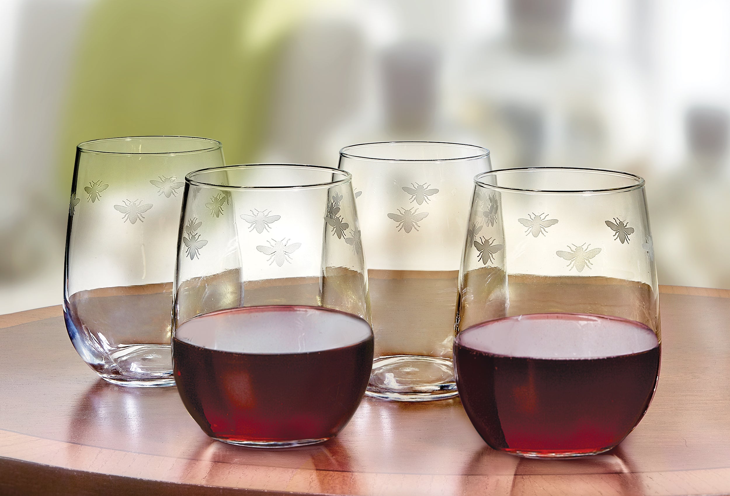 http://www.charlestongardens.com/cdn/shop/products/BeesStemlessGlasses_ALT_SU20.jpg?v=1674237684